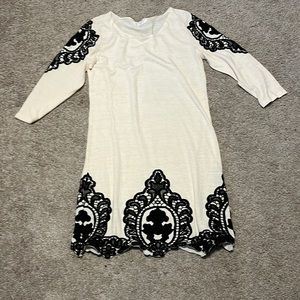Cream sweater dress with black lace